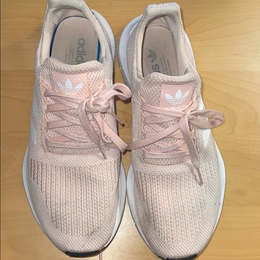 Pink and white sneakers